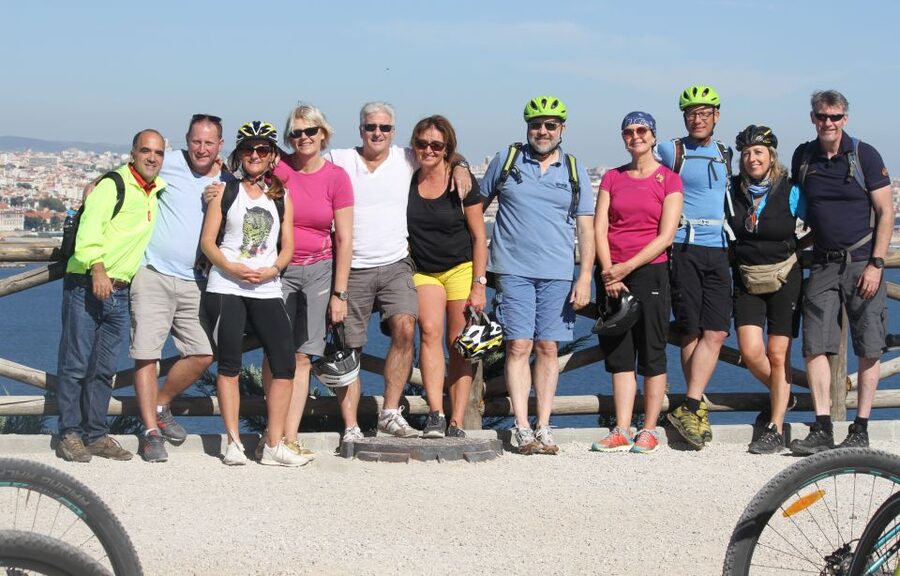 South Lisbon: 3-Hour Christ the King Electric Bike Tour - The downhill ride and Almada’s medieval past
