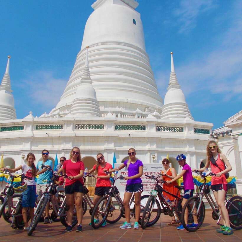Thai culture and Bangkok local life guided bike tour - Making an offering at a Chinese shrine