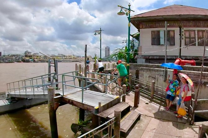 Thai Culture and Local Life 4- Hour Bangkok Bike Tour - Crossing the Chao Phraya by ferry