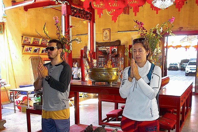 Thai Culture and Local Life 4- Hour Bangkok Bike Tour - Wat Kalayanamit and the large seated Buddha