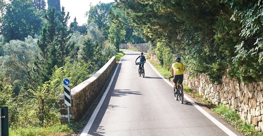 Tuscany Hills Bike Tour with Lunch at farm and Wine Tasting - The first climb earns a Florence view