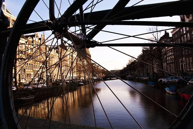 Urban Adventures Amsterdam Bike Tour, Graffiti and Magnet Fishing - The Jordaan by bicycle, not by checklist