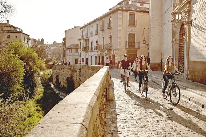 Zooming Through Granada: A Fun-Filled Electric Bike Tour - Sacromonte Abbey and the cave district
